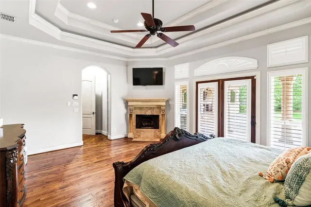 a spacious bathroom with a granite countertop tub sink and mirror