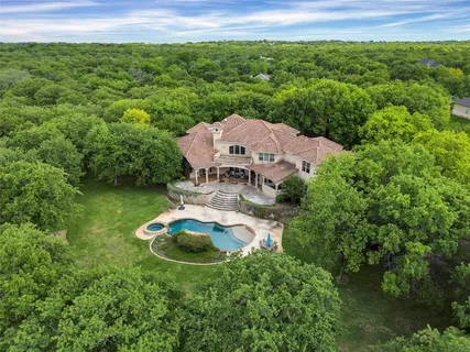 a aerial view of a house with a garden
