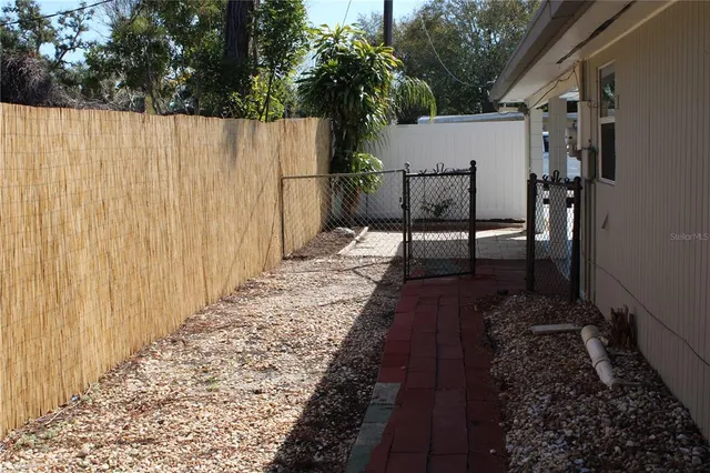 a view of a door and a window