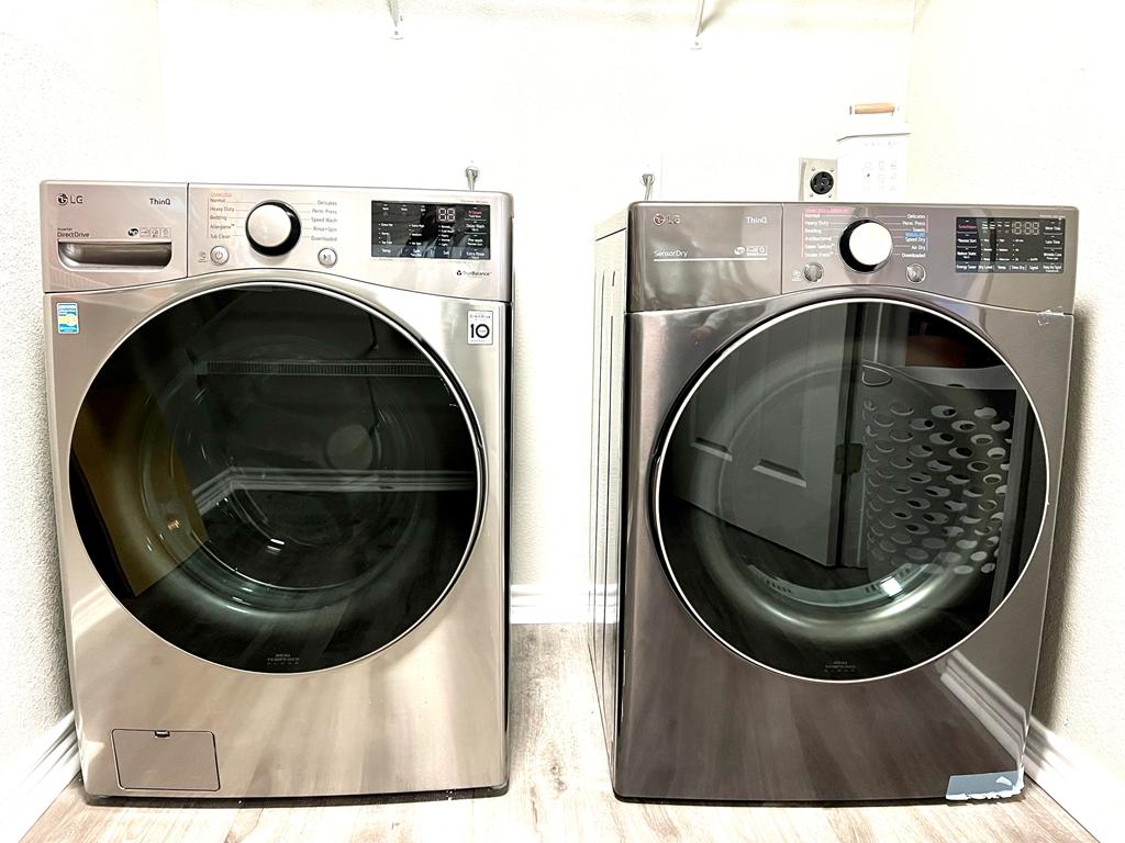 1002 Port Daniel Drive Leander, TX 78641 - Photo 10 of 12 a utility room with dryer and washer