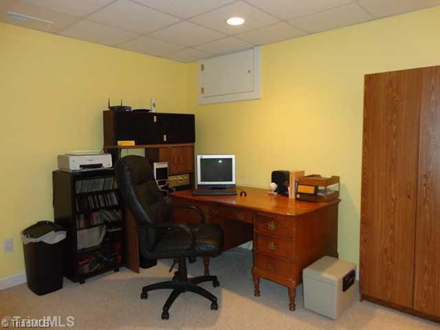 175 Creekside Ridge Drive High Point, NC 27265 - Photo 13 of 16 Studio/Study/Office. this is the other end of lower level muti purpose room.