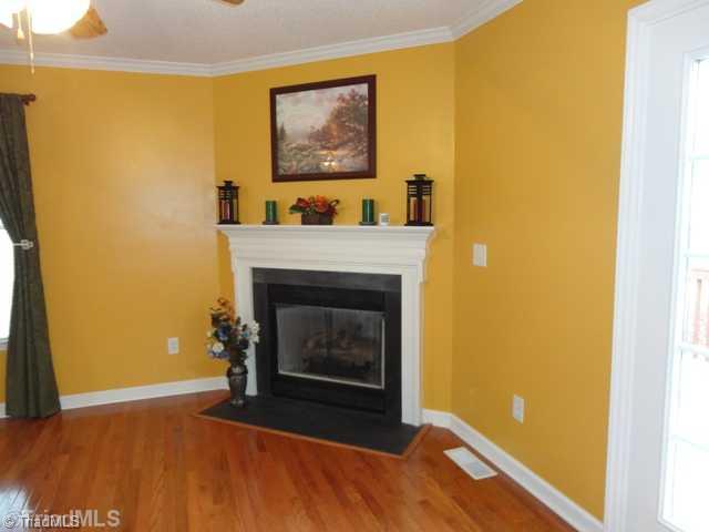 175 Creekside Ridge Drive High Point, NC 27265 - Photo 4 of 16 Living Room. Corner fireplace