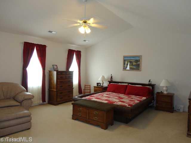 175 Creekside Ridge Drive High Point, NC 27265 - Photo 7 of 16 Master Bedroom. Vaulted ceilings make this master feel twice as big - perfect for a seating/reading area