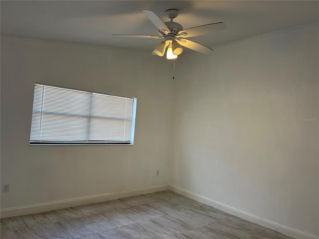 3635 Lalani Boulevard Sarasota, FL 34232 - Photo 13 of 24 an empty room with a window