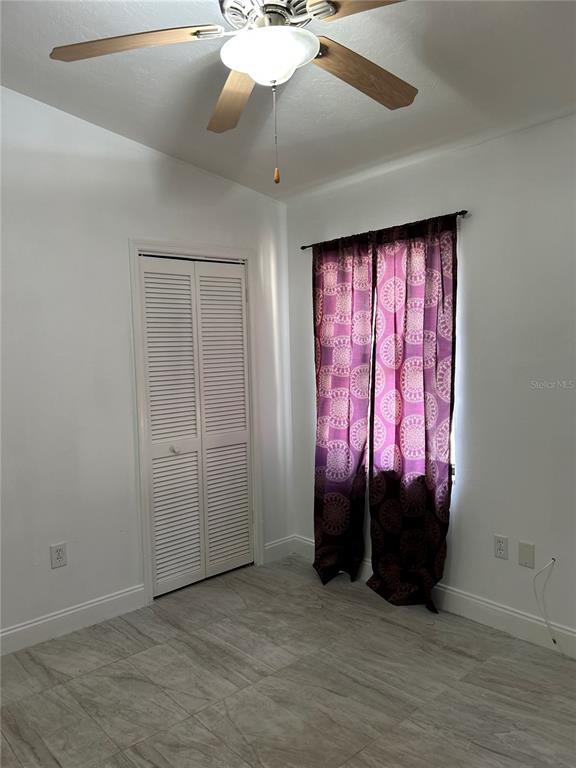 3635 Lalani Boulevard Sarasota, FL 34232 - Photo 15 of 24 an empty room with windows