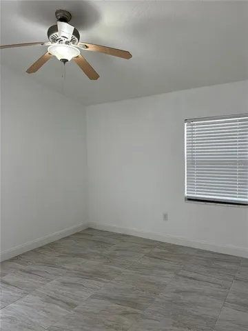 a very nice looking room with a fan
