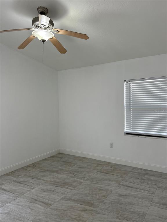 3635 Lalani Boulevard Sarasota, FL 34232 - Photo 17 of 24 a very nice looking room with a fan