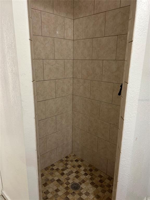 3635 Lalani Boulevard Sarasota, FL 34232 - Photo 24 of 24 a bathroom with a shower