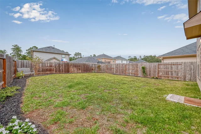 a view of a backyard with a garden