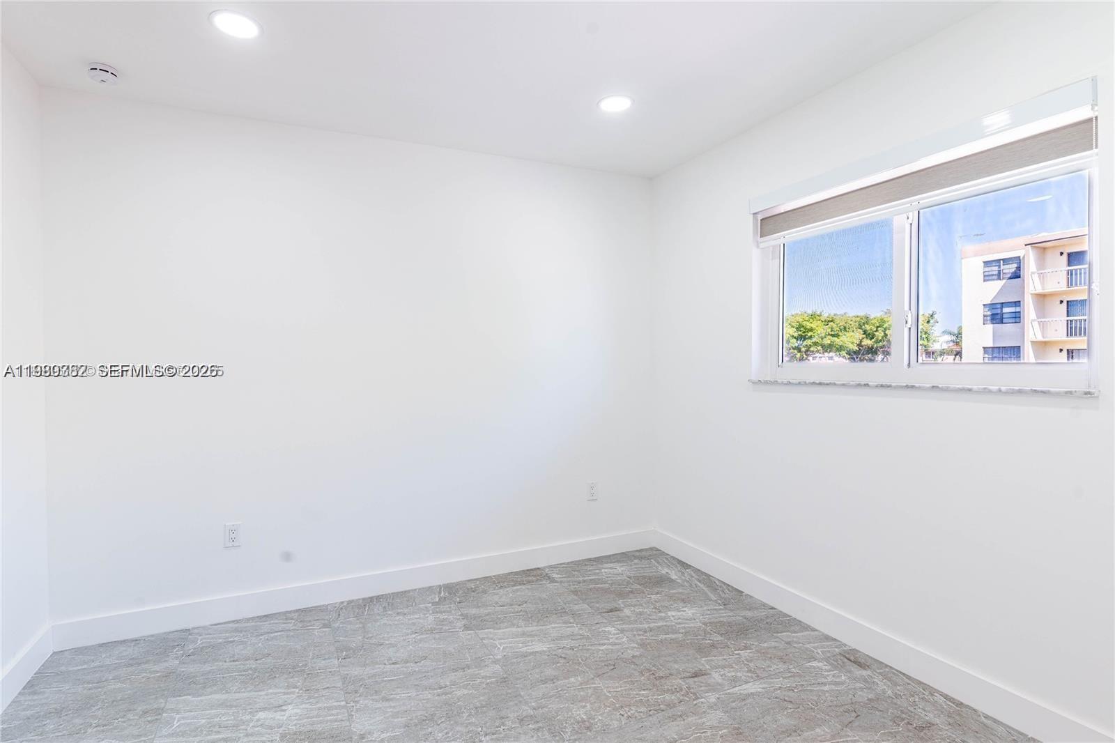 13900 Southwest 65th Terrace, Unit 9 Miami, FL 33183 - Photo 12 of 19 a view of room with window