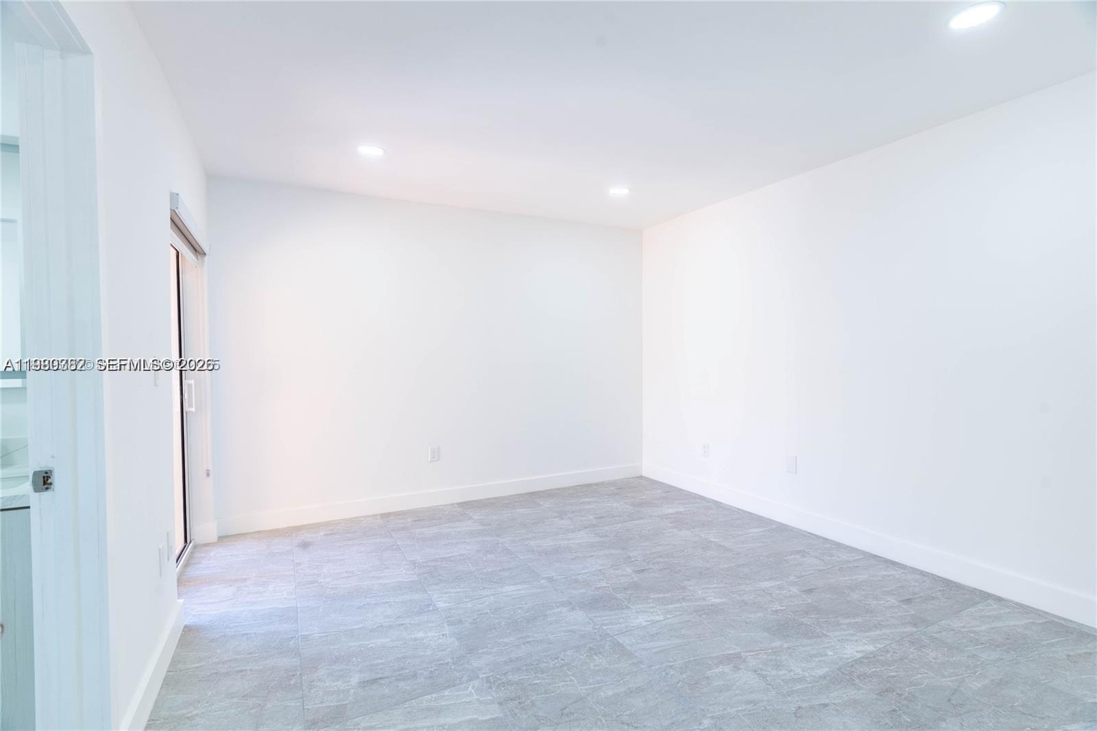 13900 Southwest 65th Terrace, Unit 9 Miami, FL 33183 - Photo 6 of 19 a view of an empty room