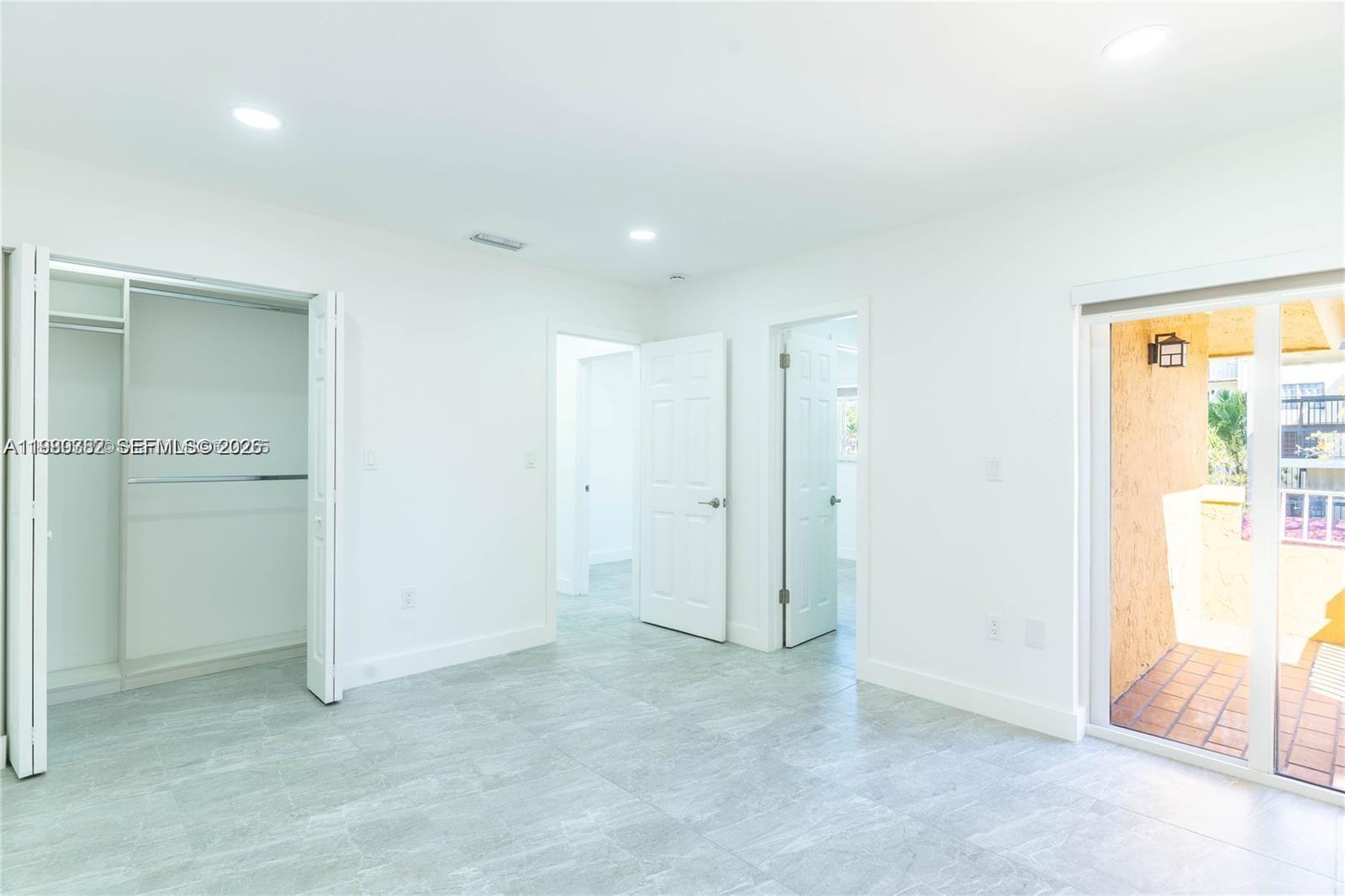 13900 Southwest 65th Terrace, Unit 9 Miami, FL 33183 - Photo 8 of 19 a view of an empty room