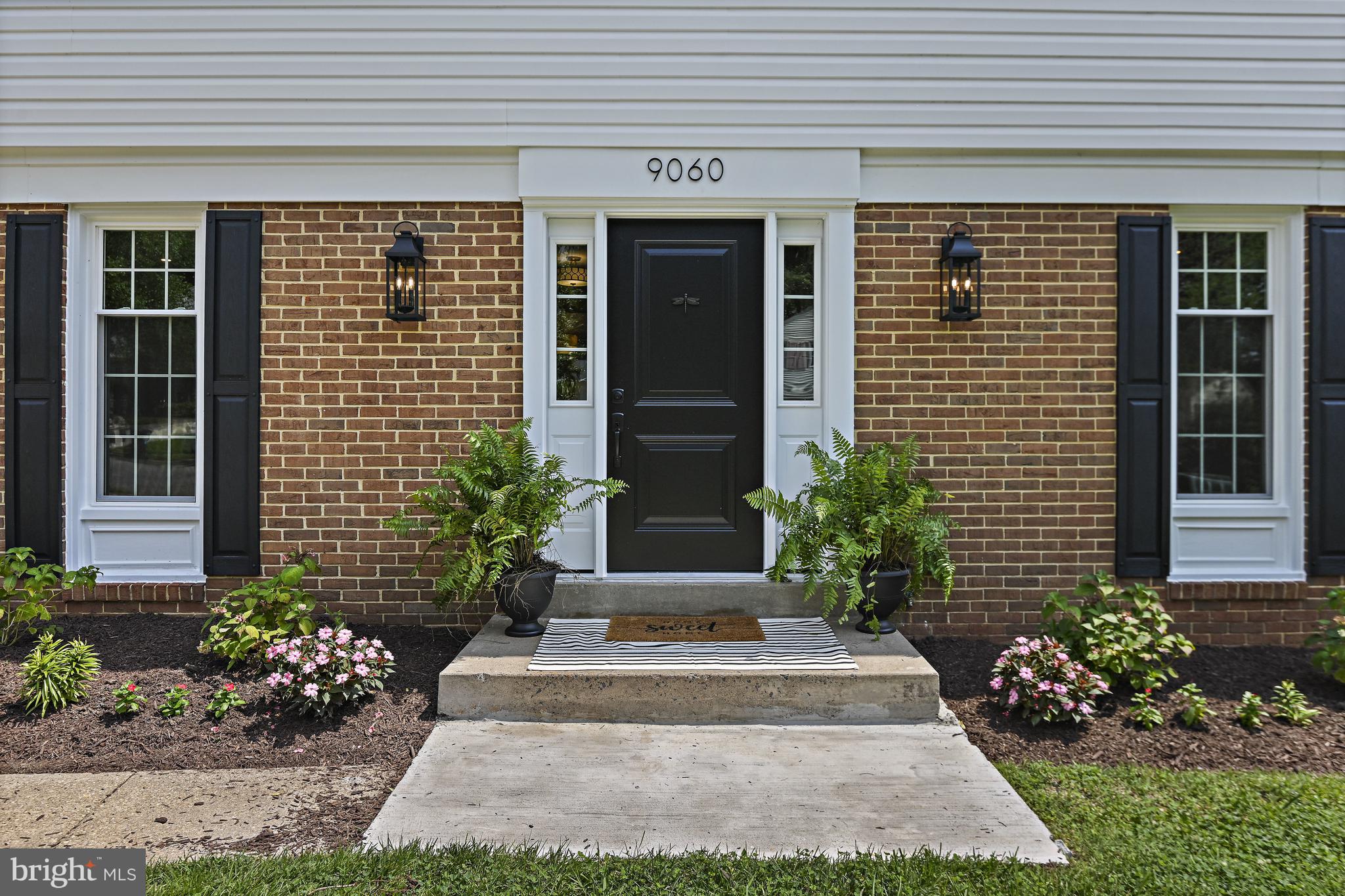 9060 Brook Ford Road Burke, VA 22015 - Photo 2 of 56 a front view of a house