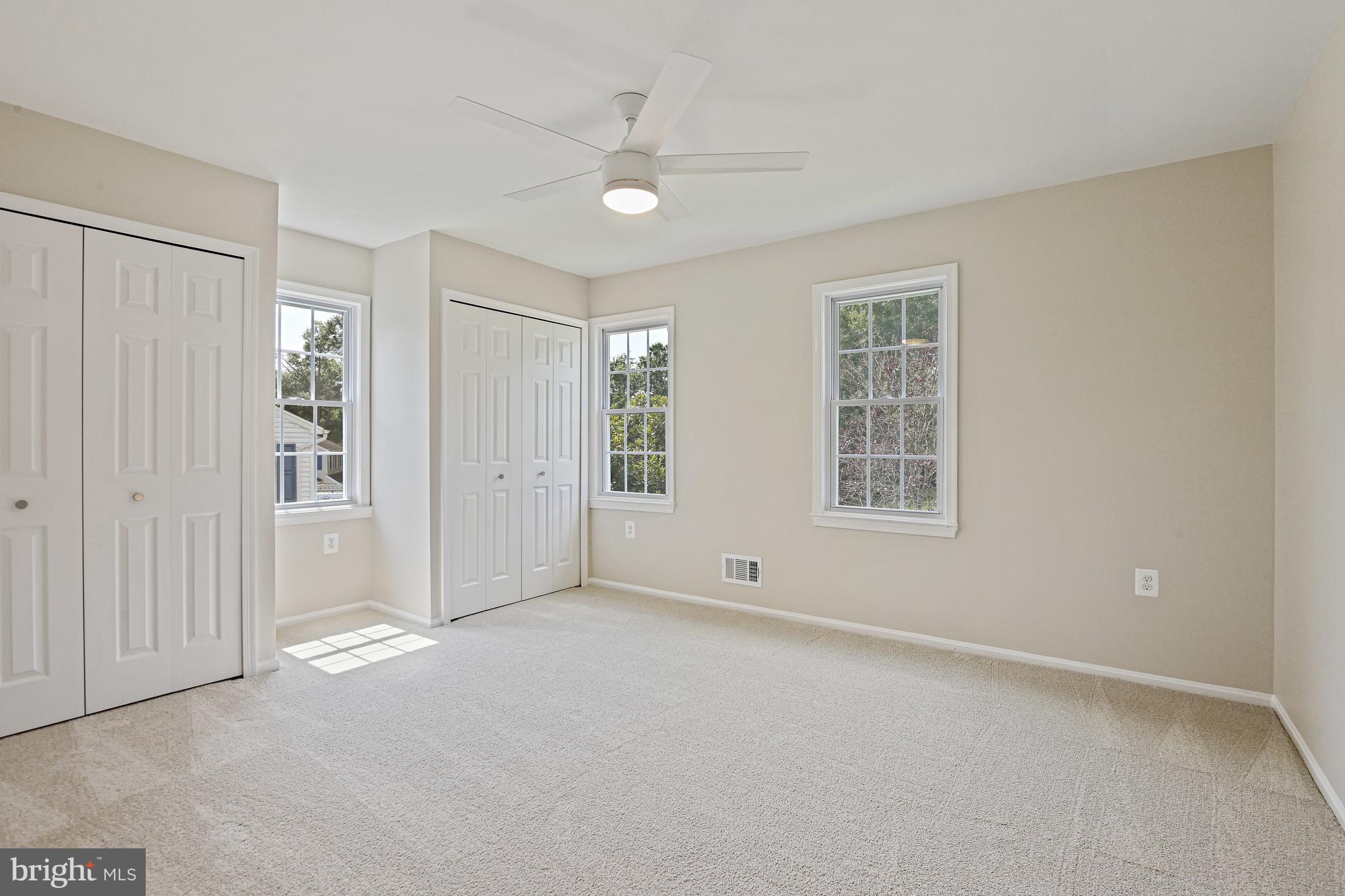 9060 Brook Ford Road Burke, VA 22015 - Photo 29 of 56 a view of an empty room with a window