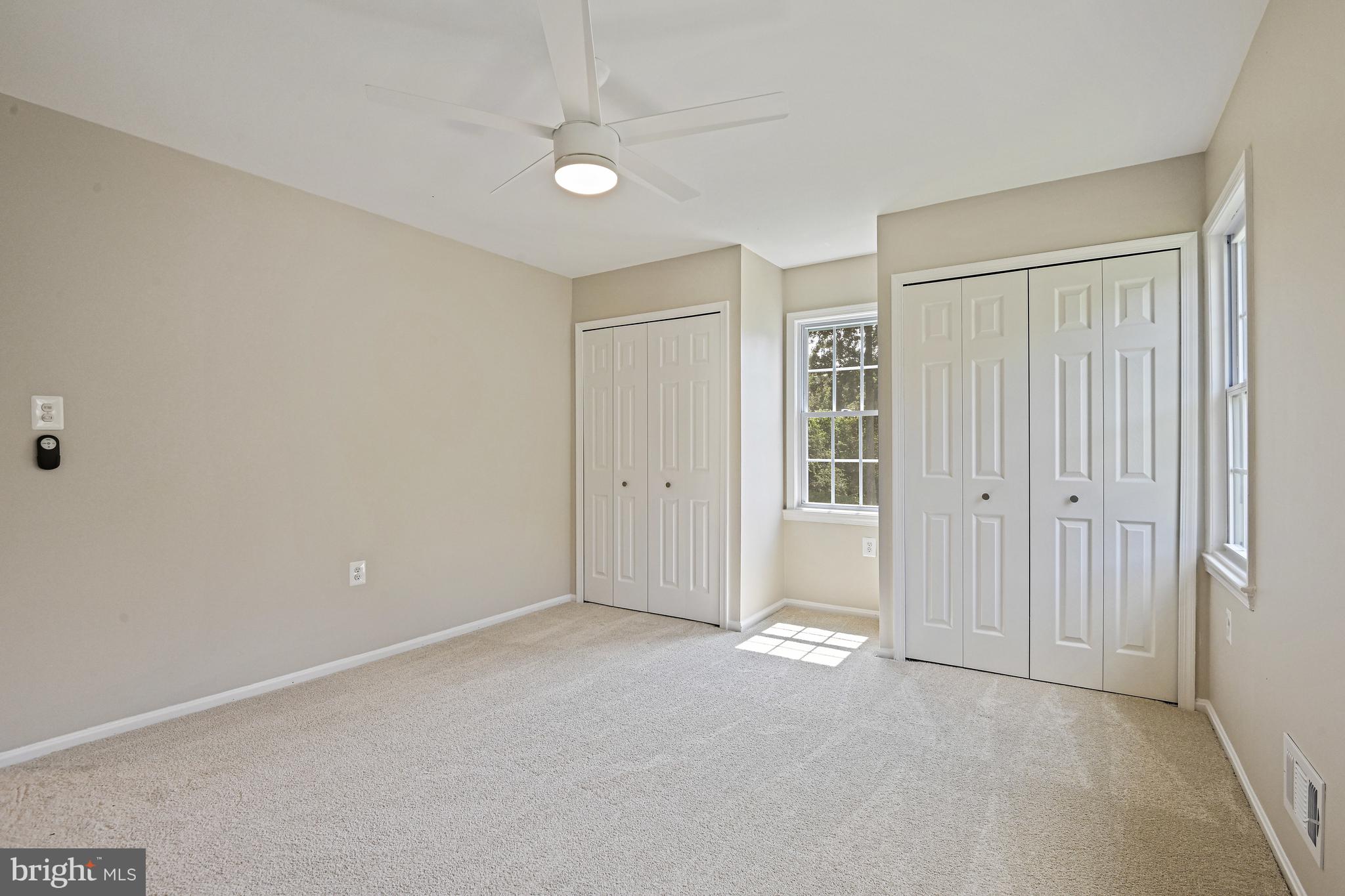 9060 Brook Ford Road Burke, VA 22015 - Photo 30 of 56 an empty room with windows