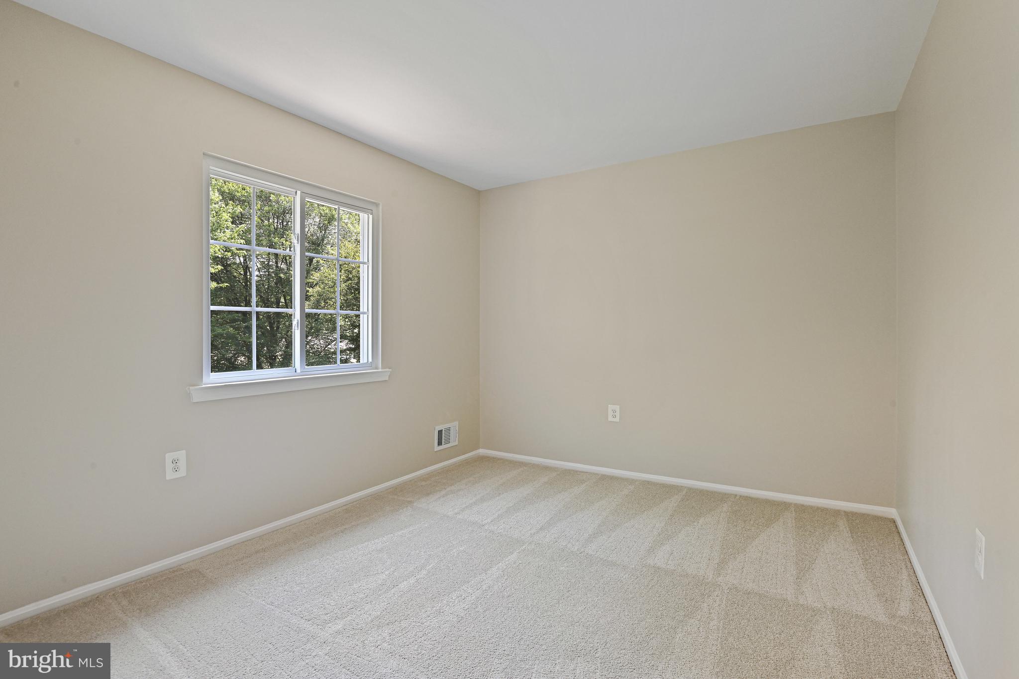 9060 Brook Ford Road Burke, VA 22015 - Photo 35 of 56 an empty room with a window