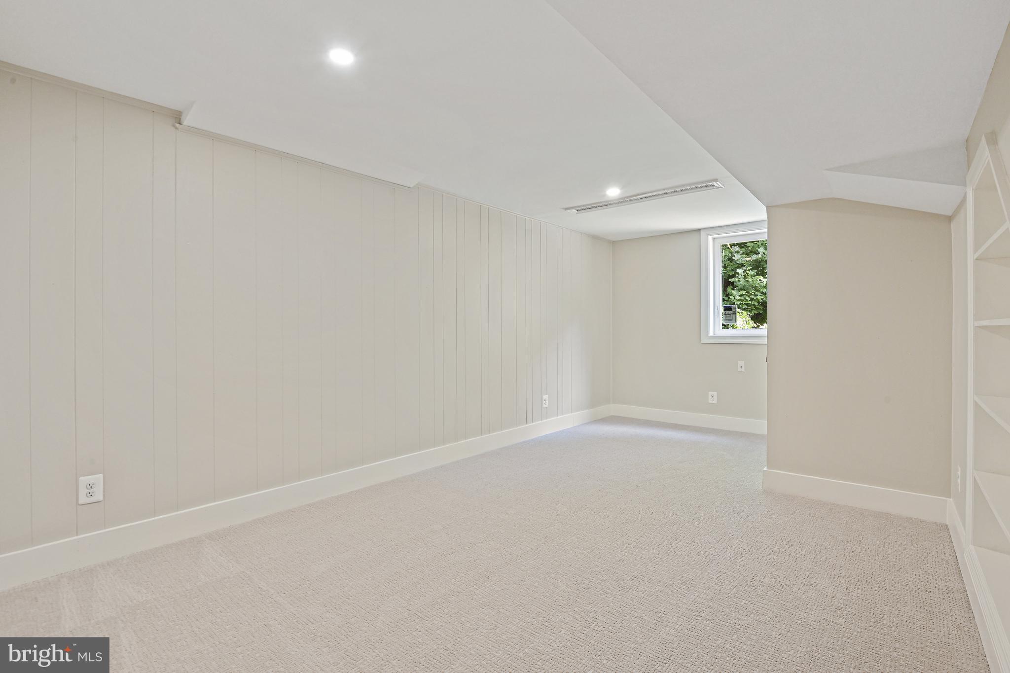 9060 Brook Ford Road Burke, VA 22015 - Photo 43 of 56 an empty room with windows