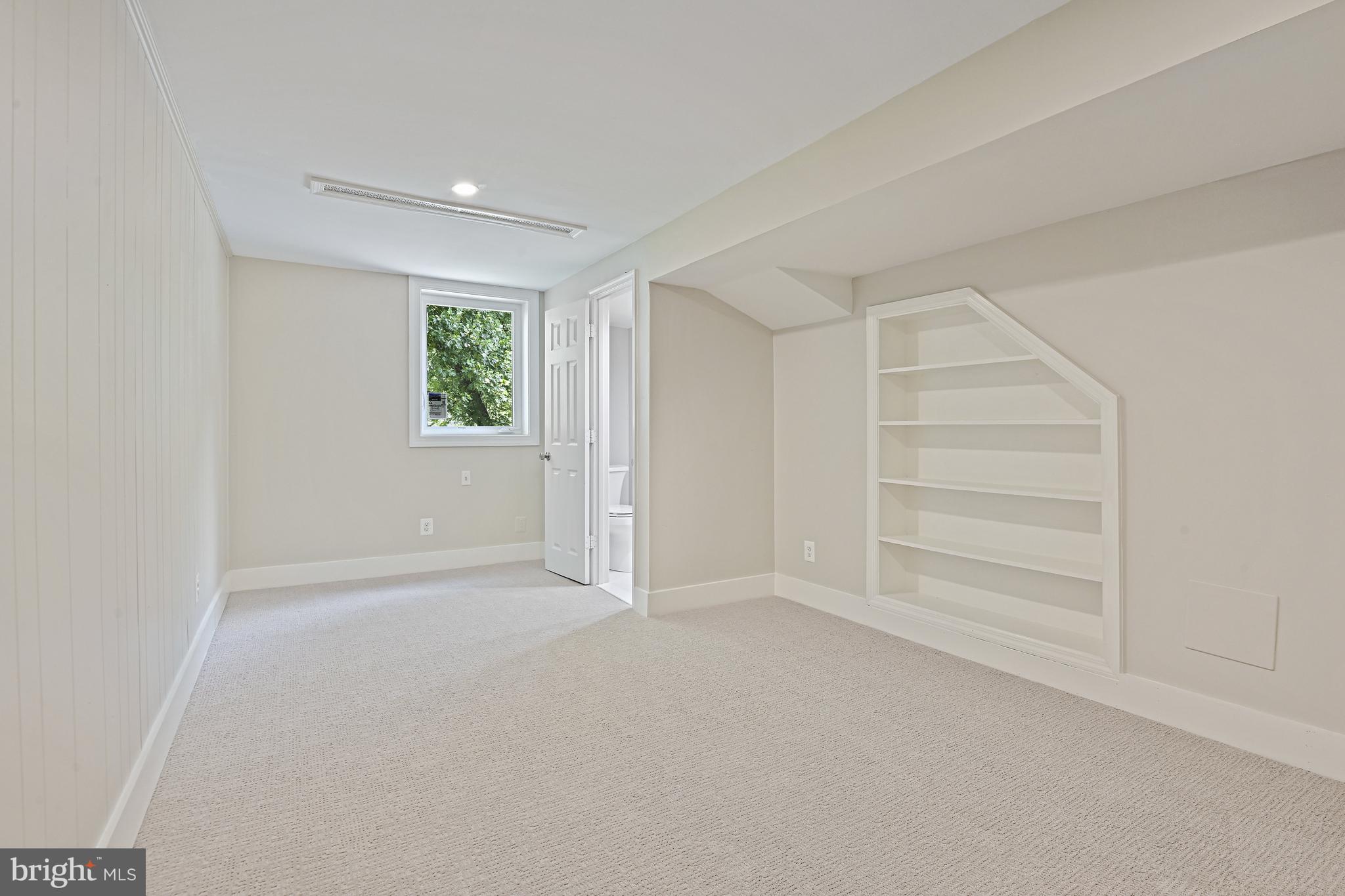 9060 Brook Ford Road Burke, VA 22015 - Photo 44 of 56 a view of an empty room with a window