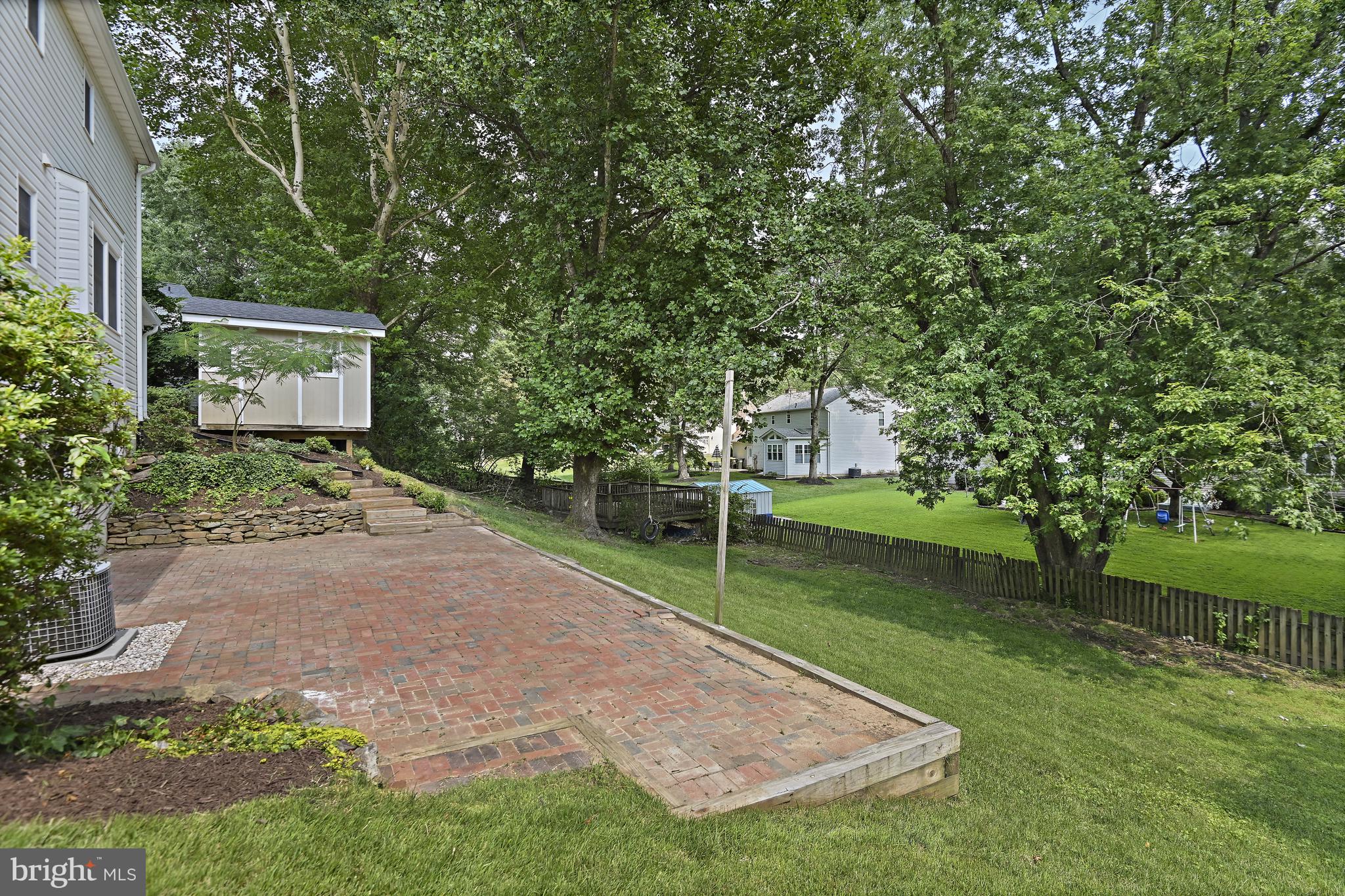 9060 Brook Ford Road Burke, VA 22015 - Photo 50 of 56 front view of a house with a yard