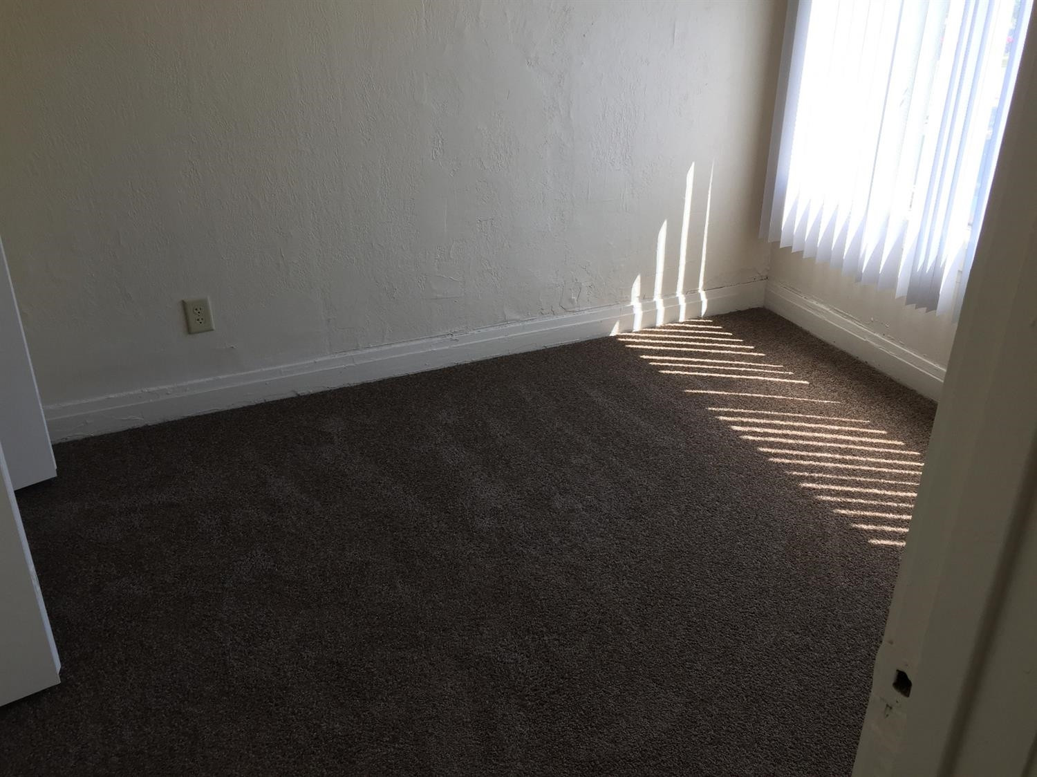 133-39 West Ridge Road Gary, IN 46408 - Photo 23 of 25 a view of an empty room and window