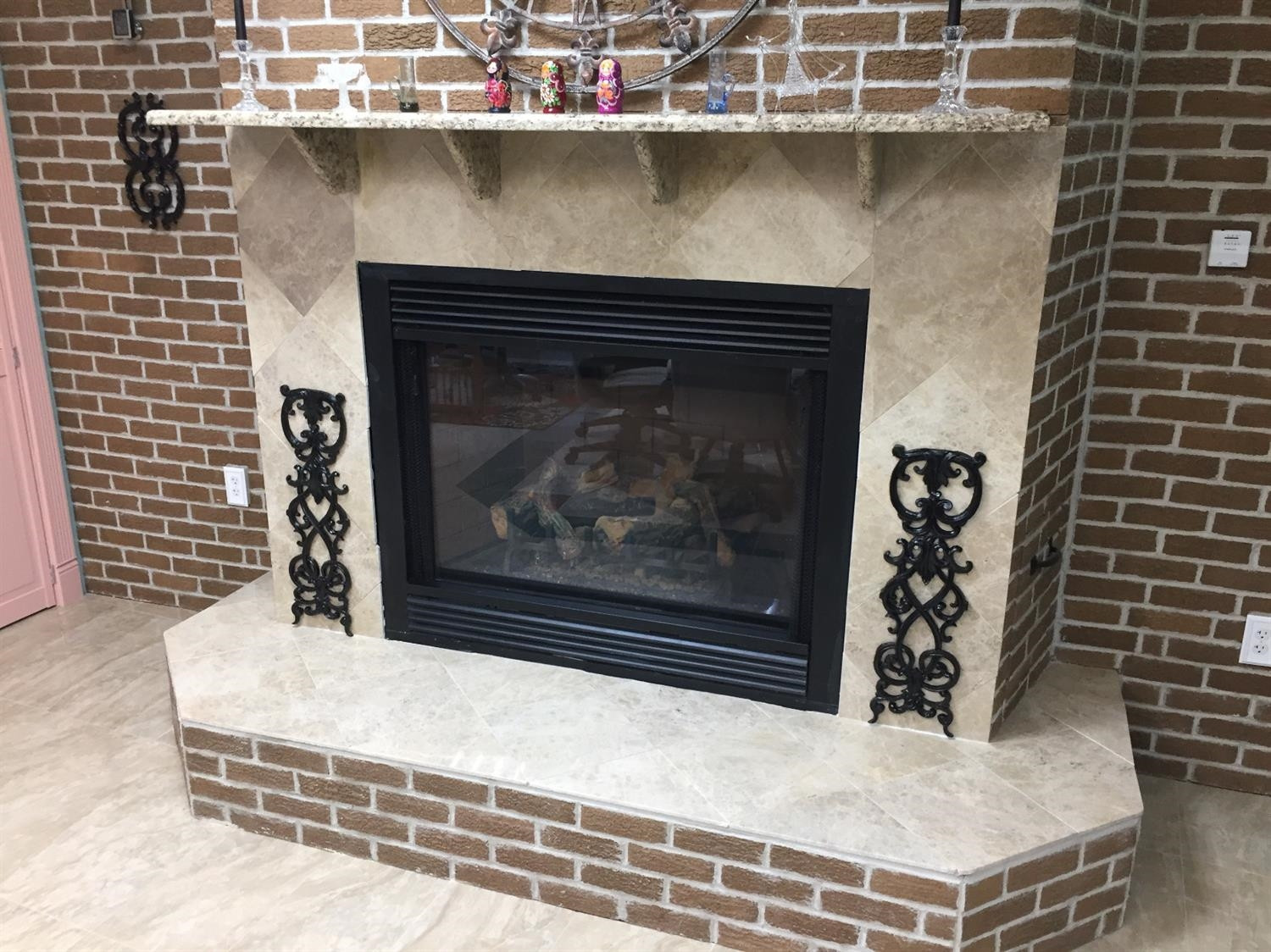 133-39 West Ridge Road Gary, IN 46408 - Photo 8 of 25 a fireplace with a clock on top of it