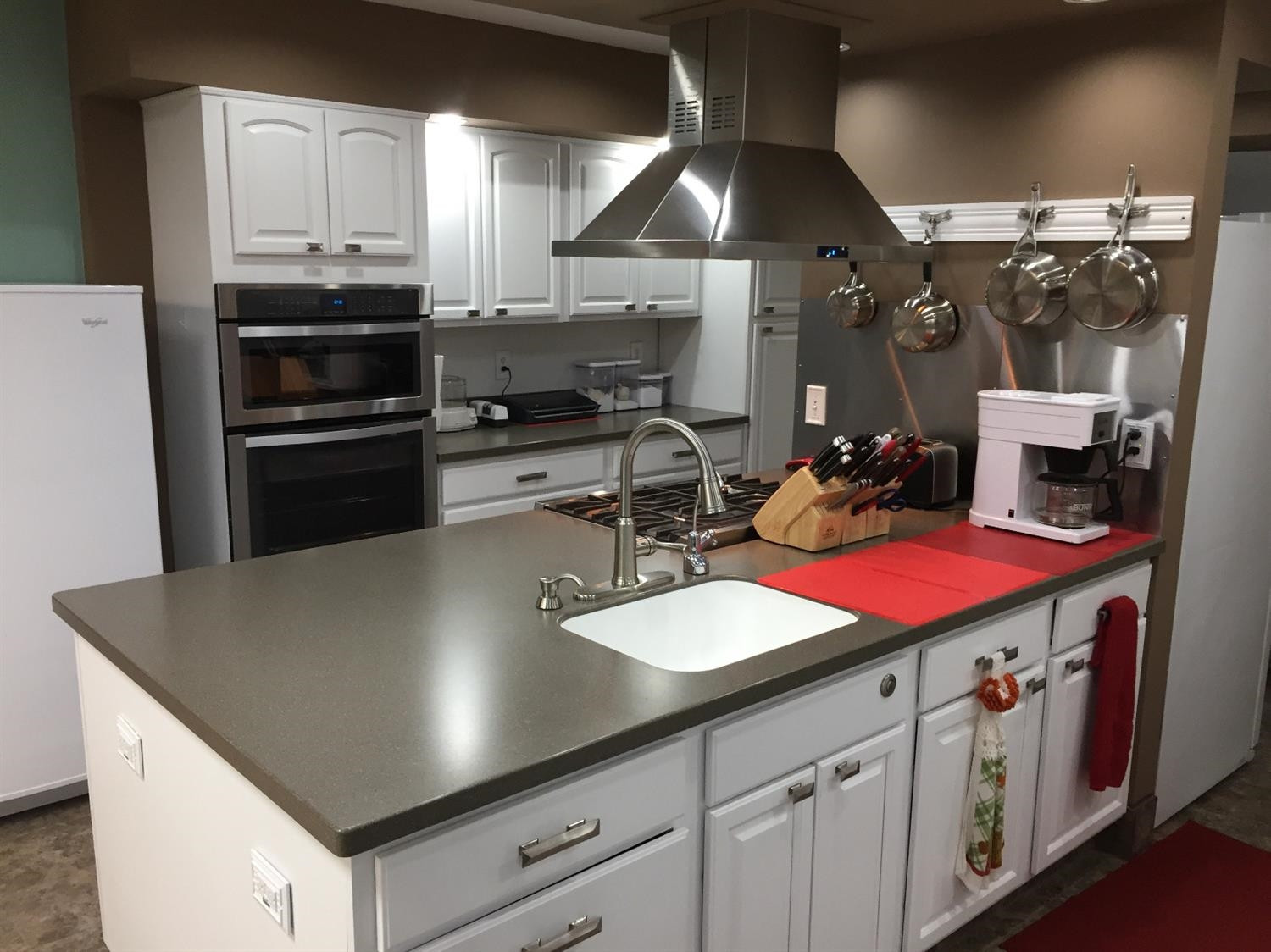 133-39 West Ridge Road Gary, IN 46408 - Photo 9 of 25 a kitchen with stainless steel appliances granite countertop a stove a sink and a microwave