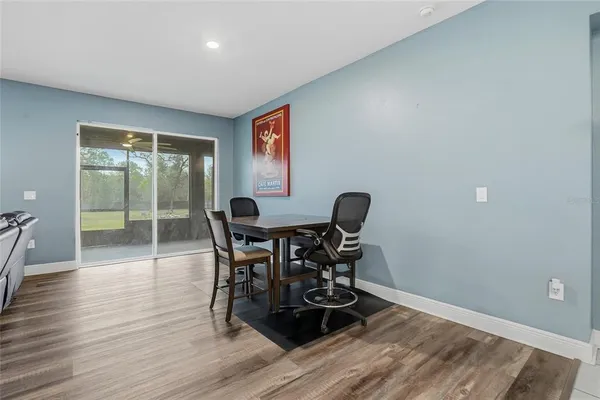 a kitchen with stainless steel appliances kitchen island granite countertop a stove microwave and sink