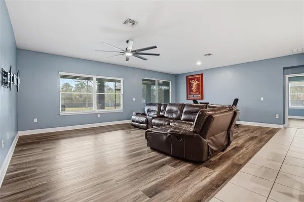 a kitchen with stainless steel appliances granite countertop a stove and a refrigerator