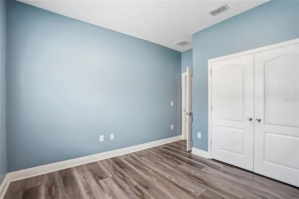 a view of a room with racks on the wall