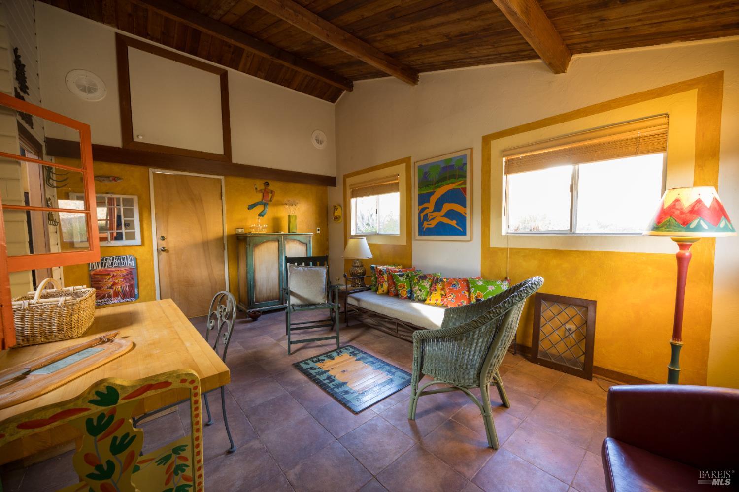 28678 River Road Cloverdale, CA 95425 - Photo 22 of 36 a living room with furniture and a window