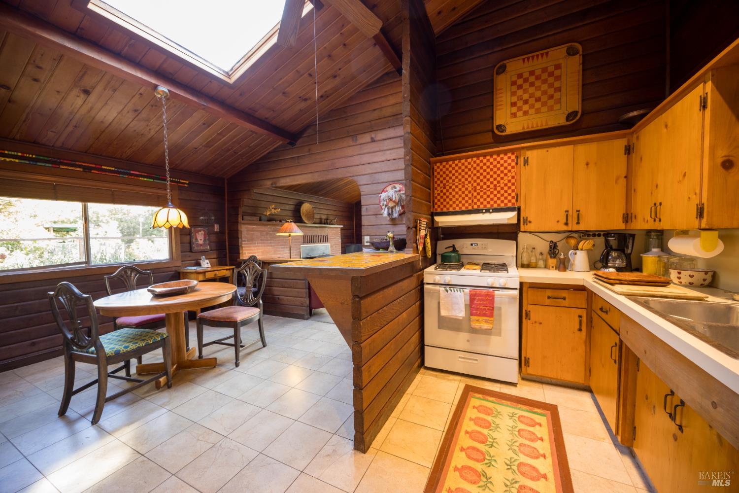 28678 River Road Cloverdale, CA 95425 - Photo 23 of 36 a kitchen with a sink appliances and cabinets