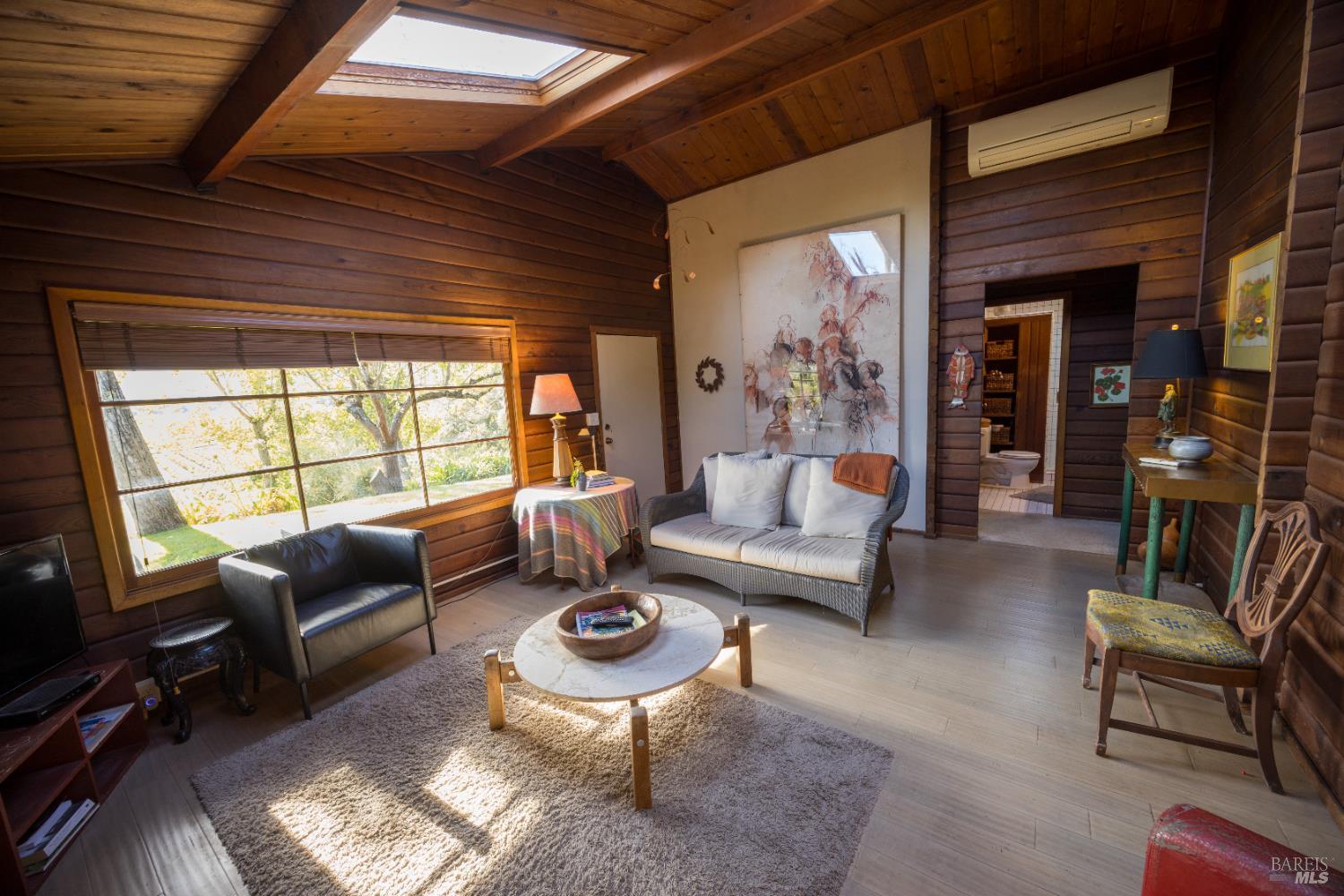 28678 River Road Cloverdale, CA 95425 - Photo 27 of 36 a living room with furniture and a large window