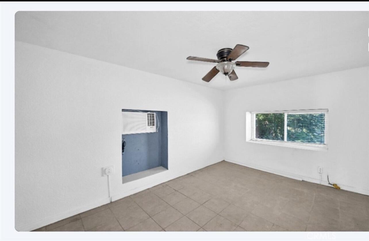 82481 Valencia Avenue Indio, CA 92201 - Photo 10 of 13 a view of room with ceiling fan