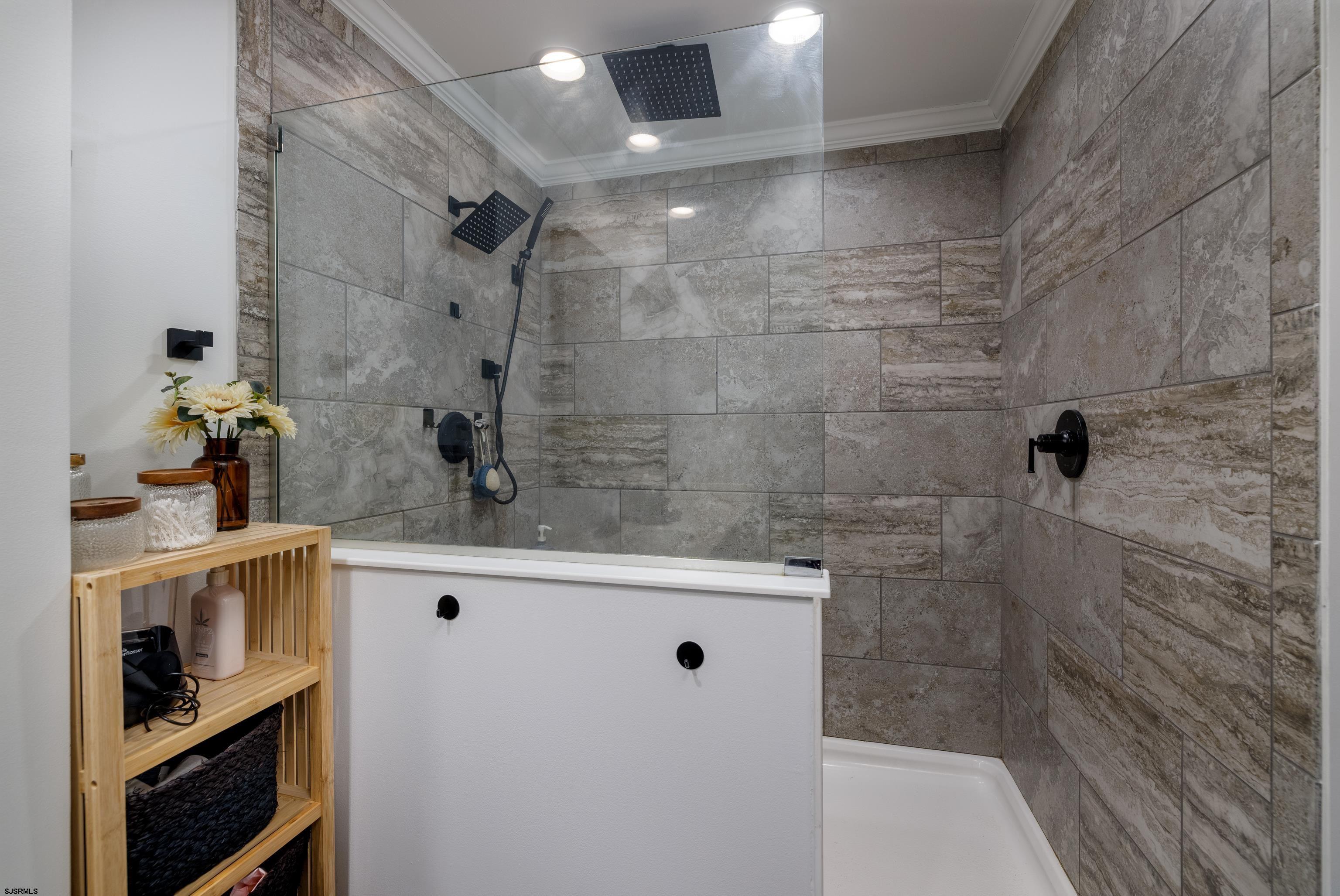 8 Gibson Lane Rio Grande, NJ 08210 - Photo 24 of 45 a bathroom with a sink a toilet and shower