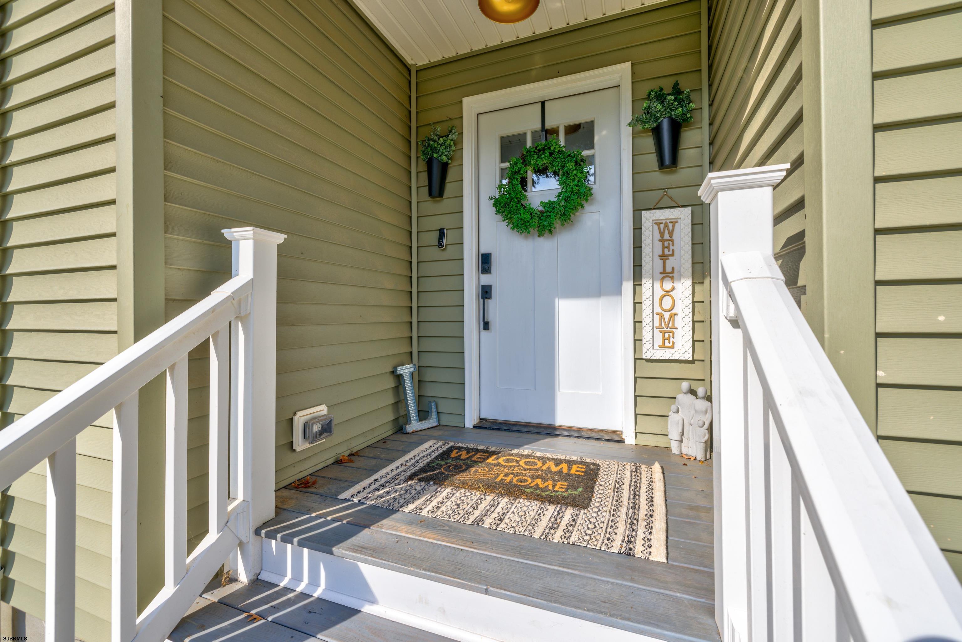 8 Gibson Lane Rio Grande, NJ 08210 - Photo 3 of 45 a view of front door of house