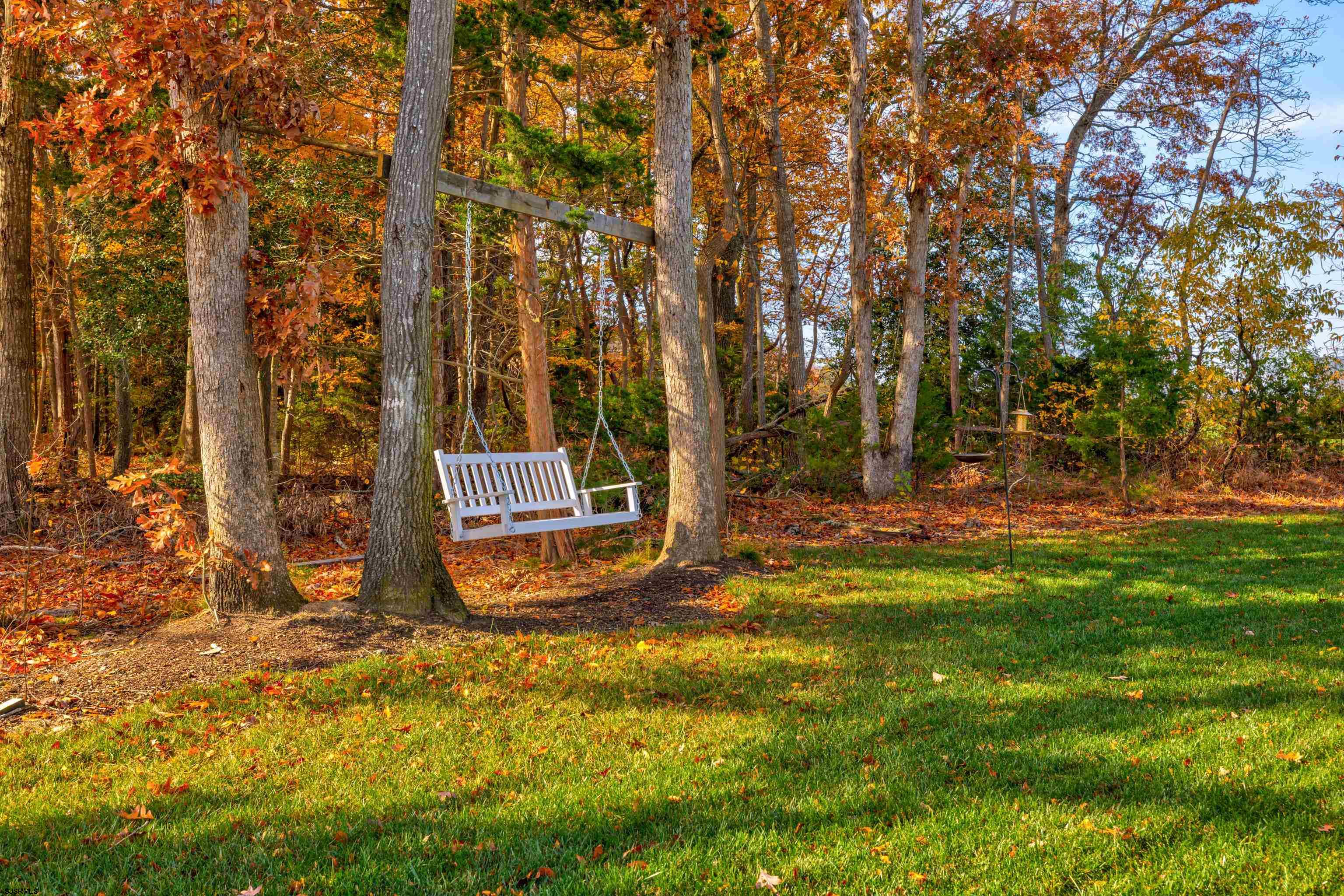 8 Gibson Lane Rio Grande, NJ 08210 - Photo 40 of 45 a backyard of a house with lots of green space