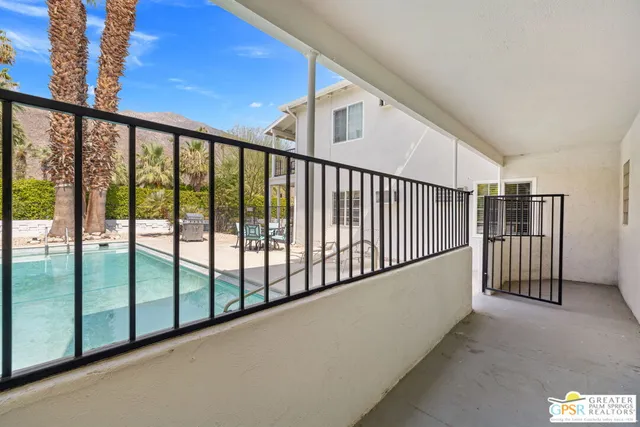 a view of a hallway with staircase