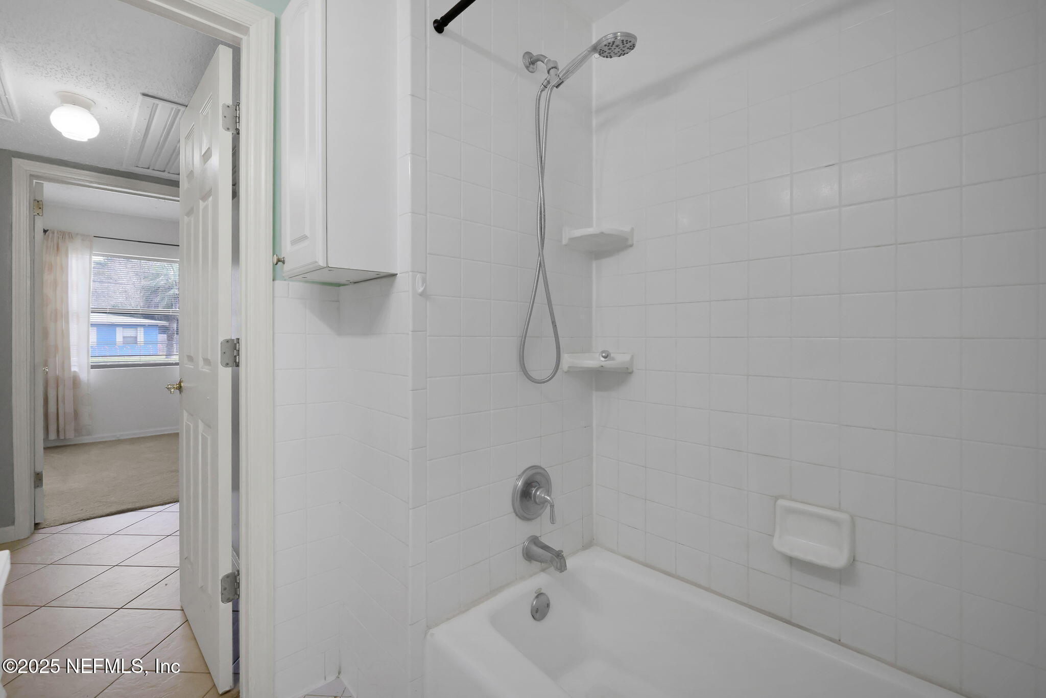 466 Aiken Road Jacksonville, FL 32216 - Photo 20 of 36 a bathroom with a shower