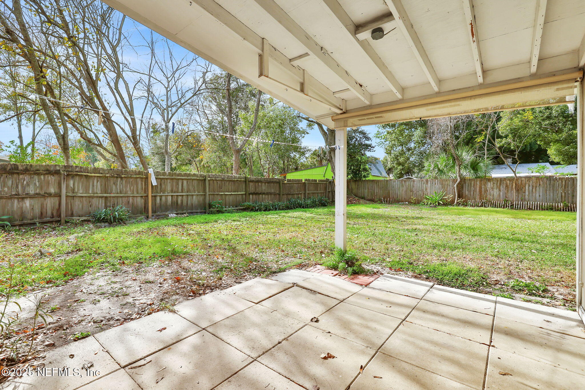 466 Aiken Road Jacksonville, FL 32216 - Photo 34 of 36 a view of a backyard with a bird bath