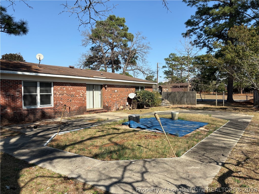 6324 Stoney Point Loop Fayetteville, NC 28306 - Photo 24 of 24 a view of a swimming pool with an outdoor seating
