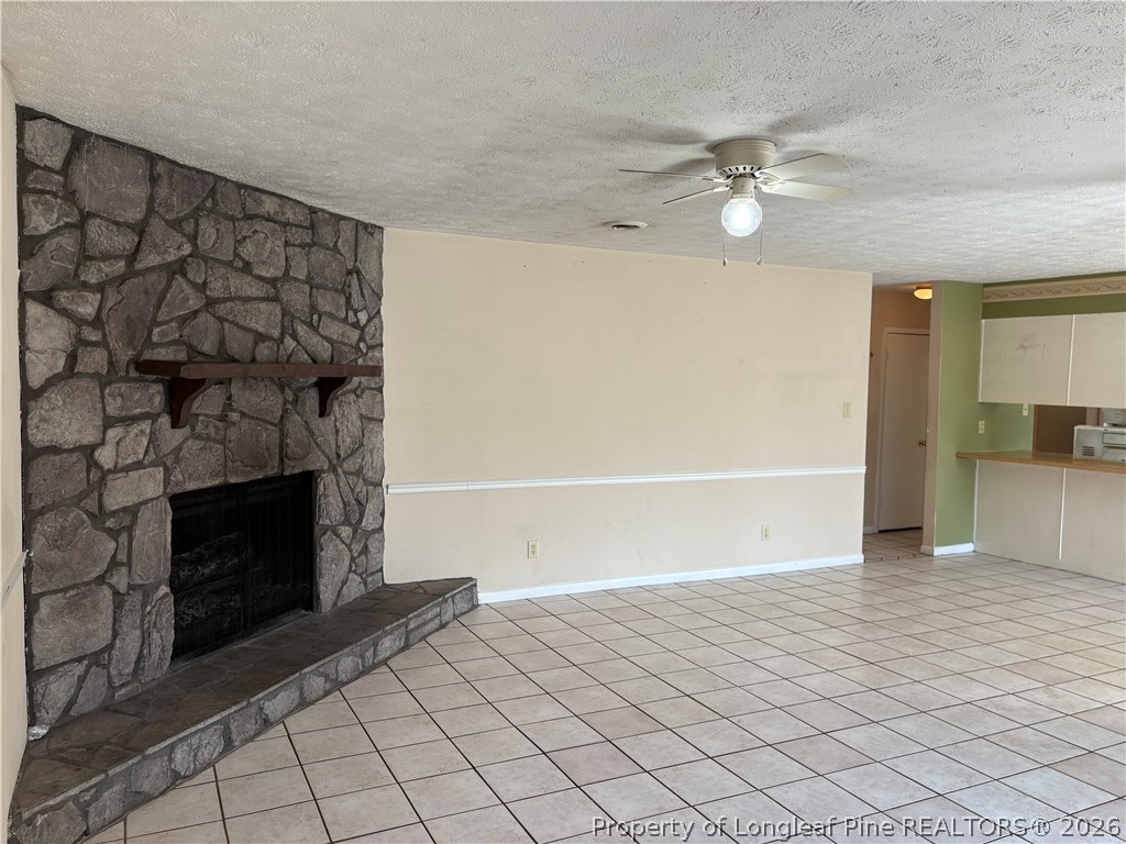 6324 Stoney Point Loop Fayetteville, NC 28306 - Photo 4 of 24 a view of an empty room and fire place