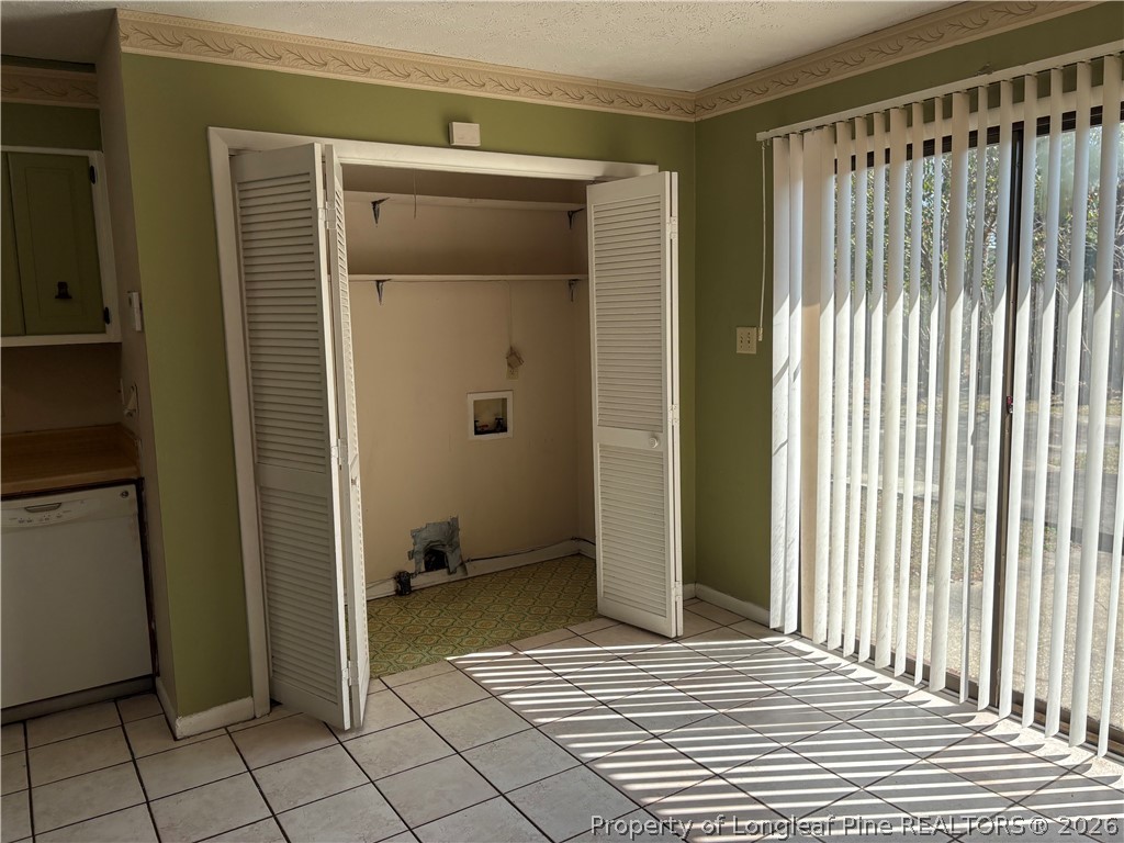 6324 Stoney Point Loop Fayetteville, NC 28306 - Photo 6 of 24 a view of a porch with a door and wooden floor