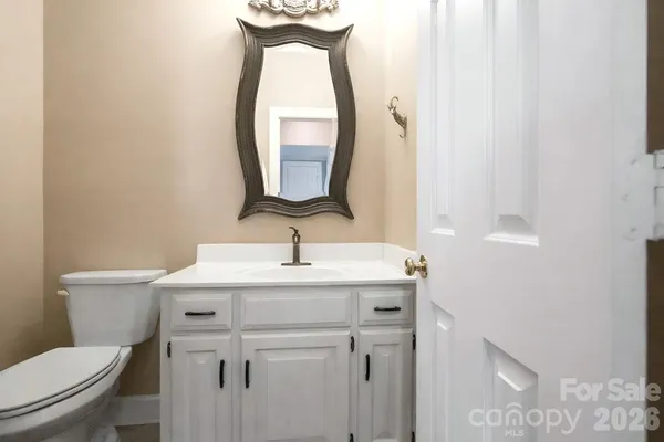 a bathroom with a bathtub and a window