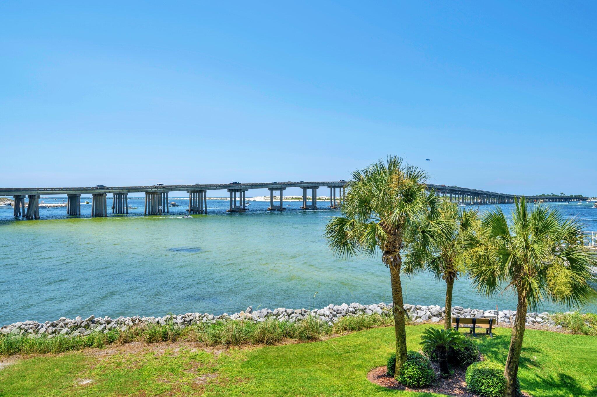 5 Calhoun Avenue, Unit 203 Destin, FL 32541 - Photo 11 of 67 a view of a swimming pool with a yard