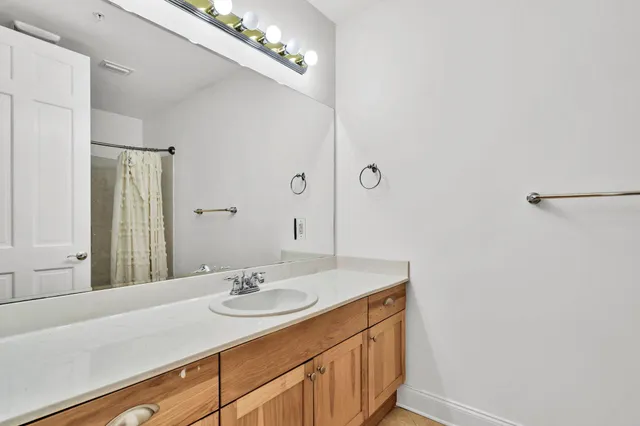 a swimming pool with outdoor seating and yard