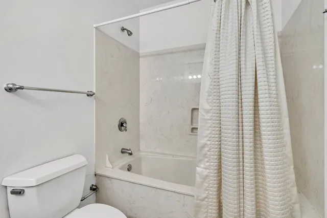 a view of a balcony with an ocean