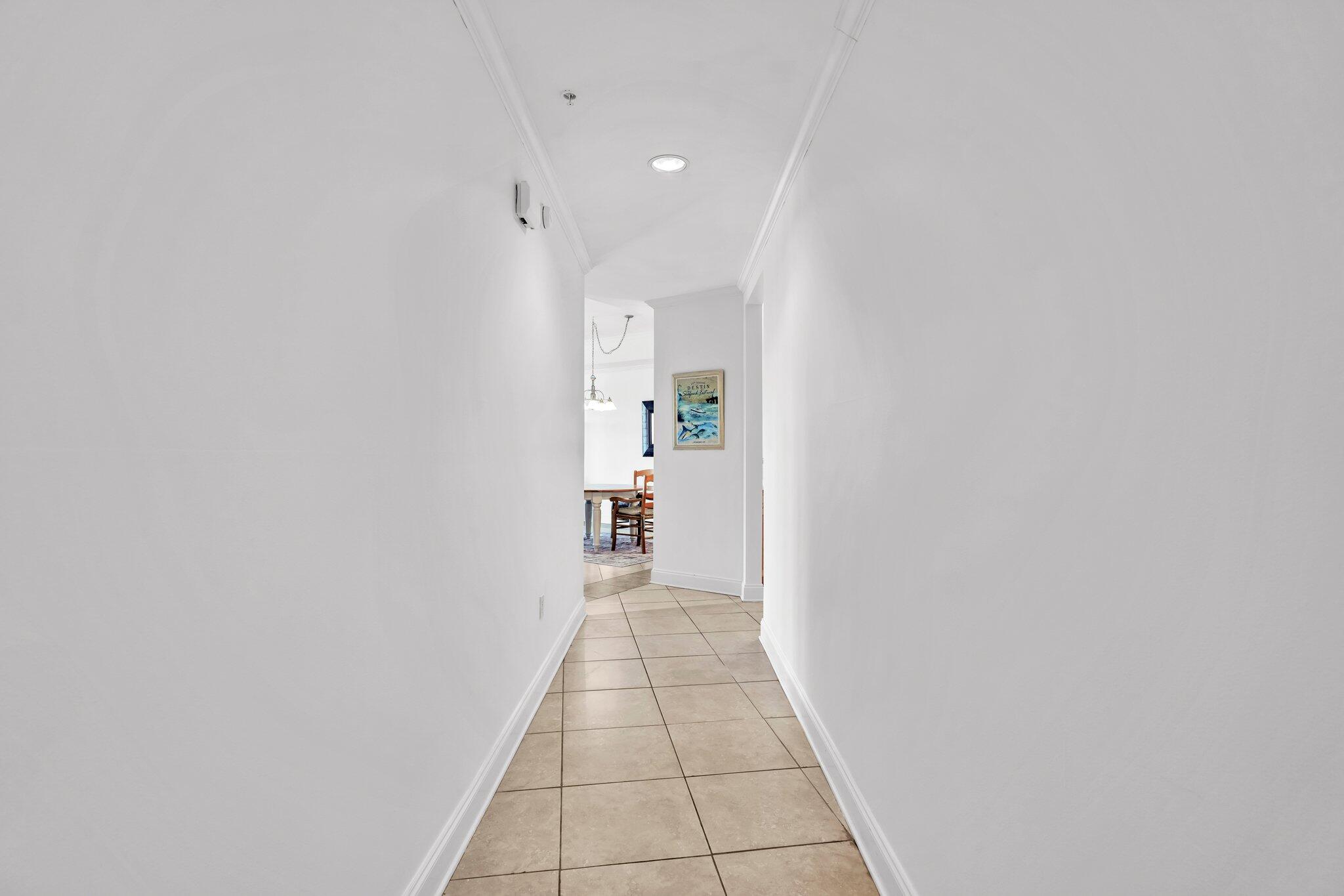 5 Calhoun Avenue, Unit 203 Destin, FL 32541 - Photo 43 of 67 a view of a hallway with wooden floor