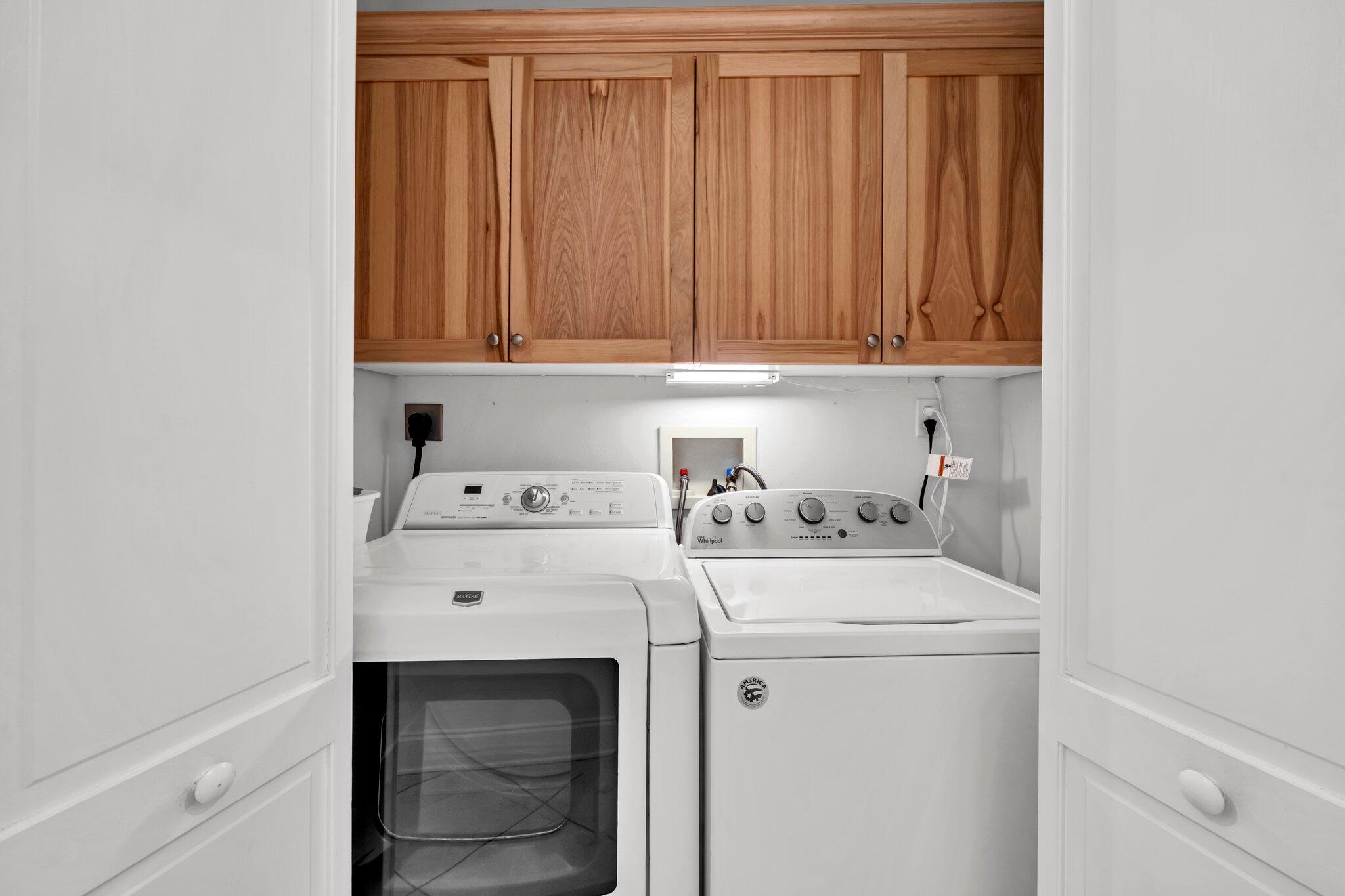 5 Calhoun Avenue, Unit 203 Destin, FL 32541 - Photo 44 of 67 a utility room with dryer and washer