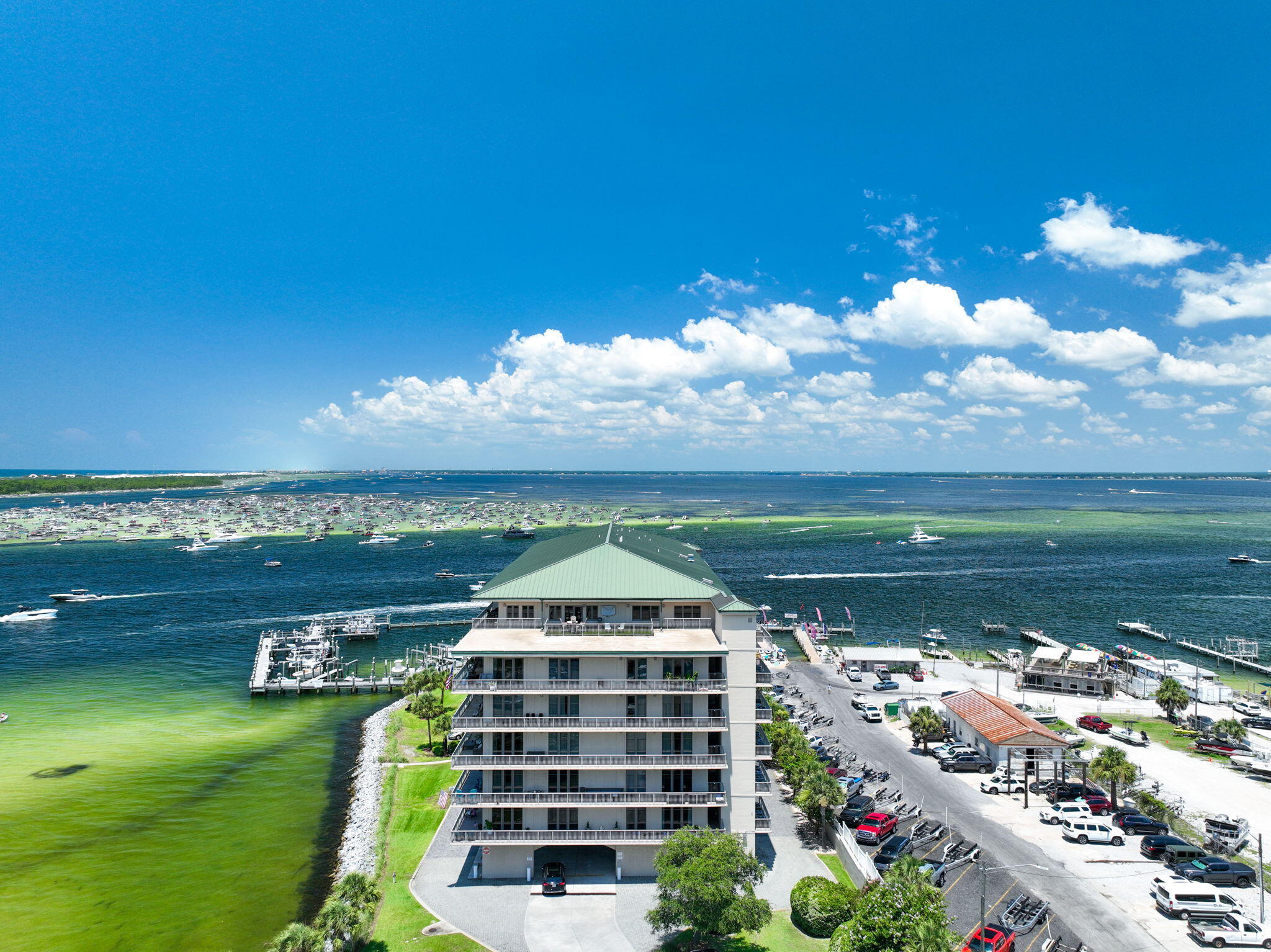 5 Calhoun Avenue, Unit 203 Destin, FL 32541 - Photo 54 of 67 a view of a lake with a big yard