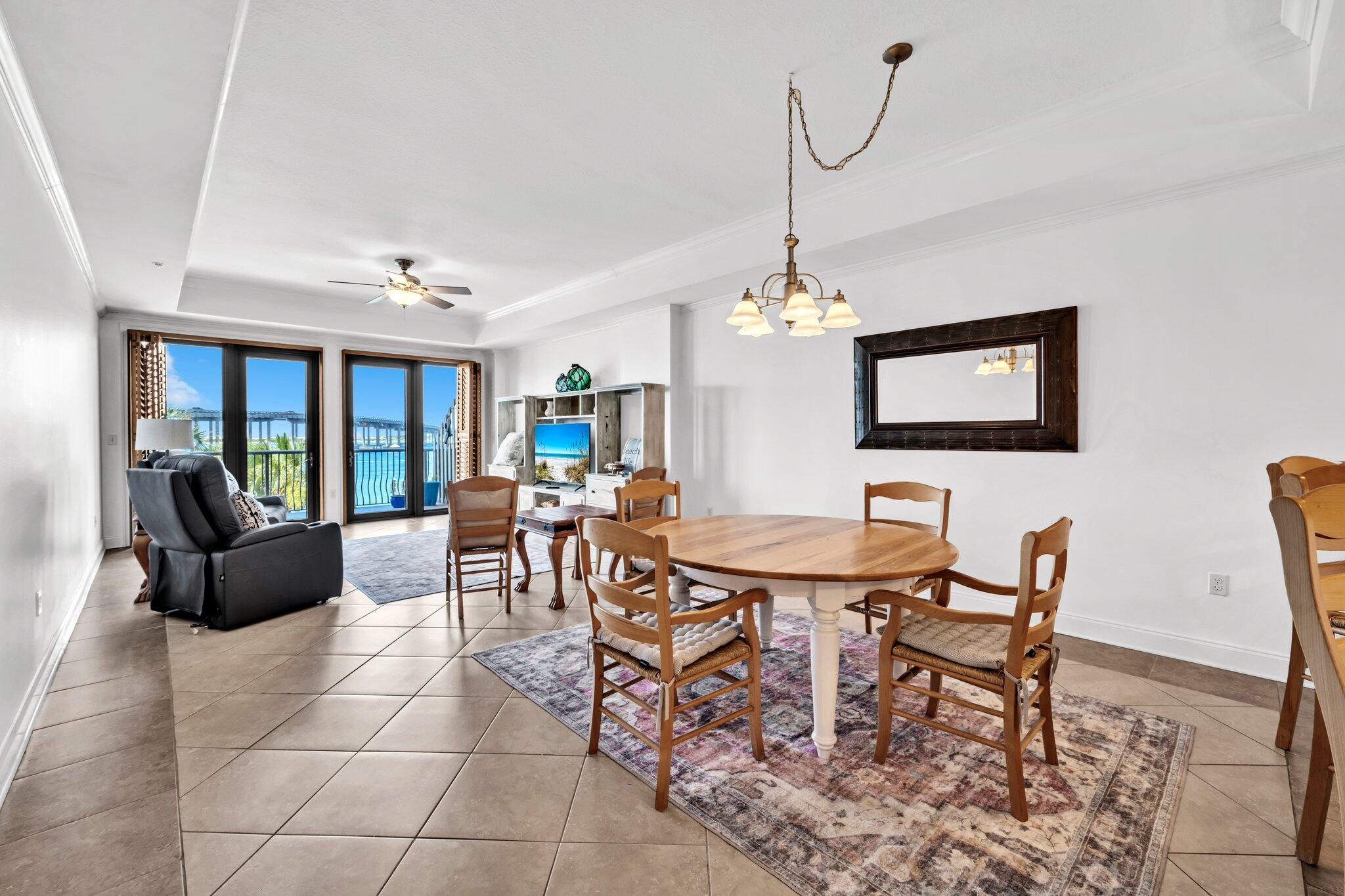 5 Calhoun Avenue, Unit 203 Destin, FL 32541 - Photo 8 of 67 a view of a dining room with furniture